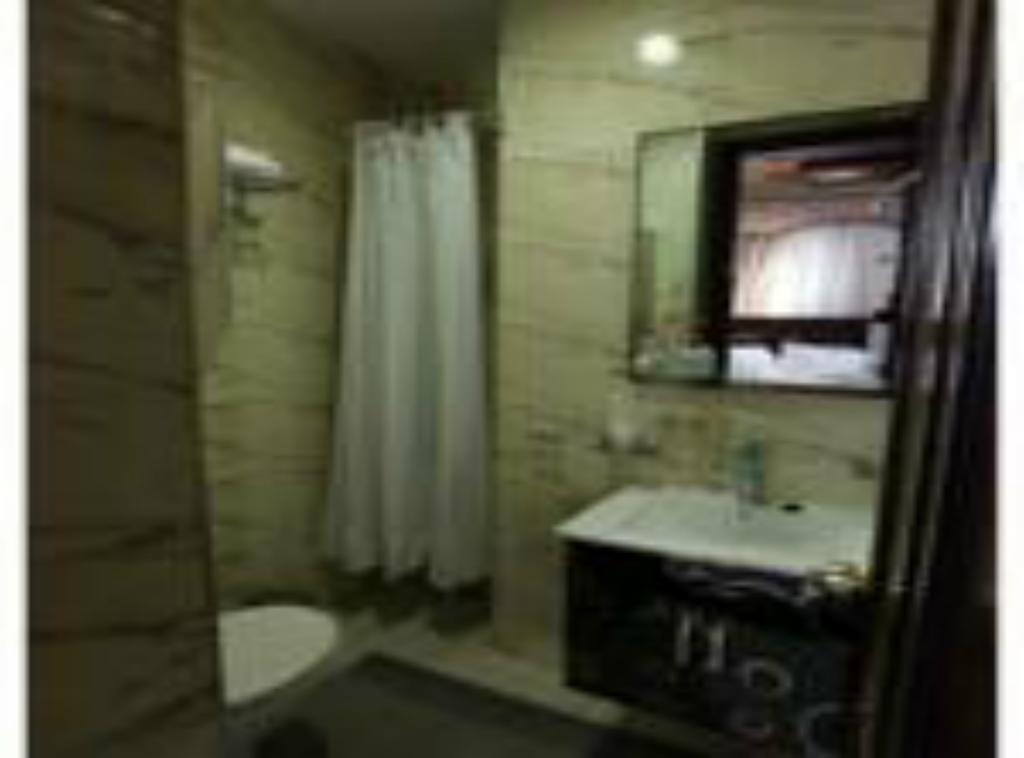 Roomi Suites Hotel Kuwait City Bagian luar foto